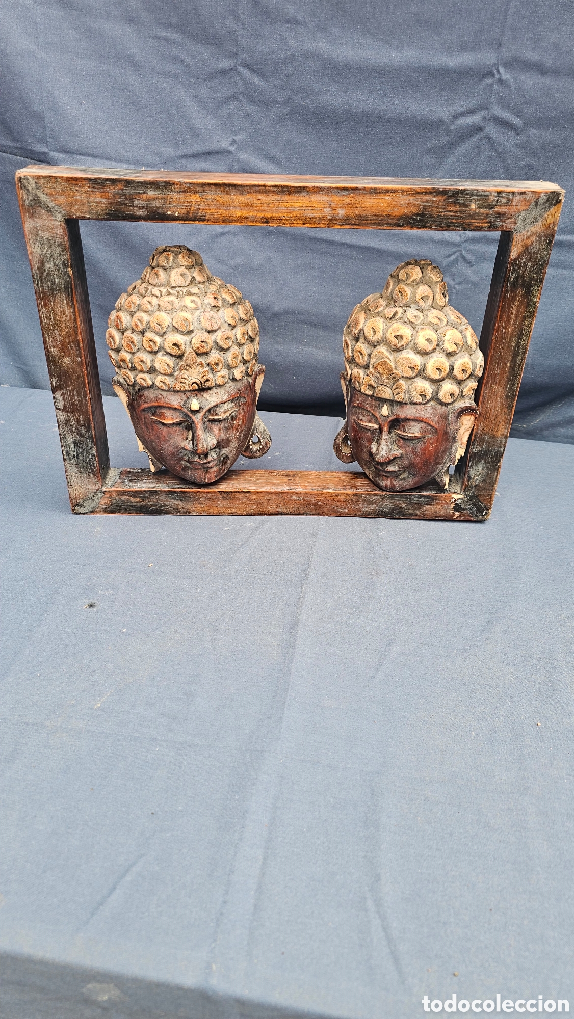 Arte: Decoraci&oacute;n de budas tallados en madera