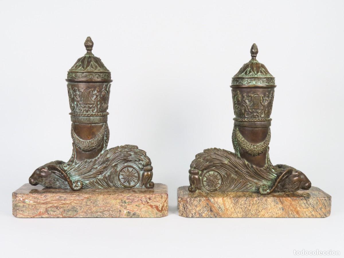 Arte: Pareja sujeta libros en forma de copas bases carneros bronce peana de m&aacute;rmol hacia 1900