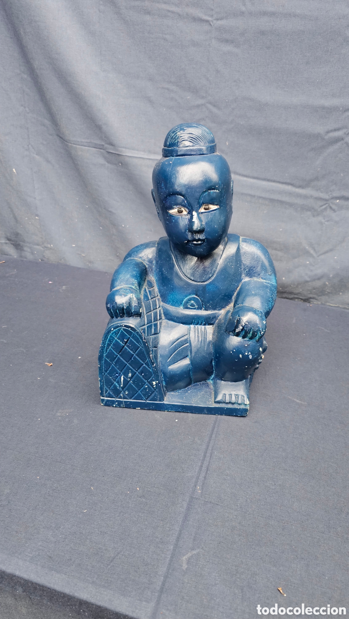 Arte: Escultura asi&aacute;tica de madera tallada