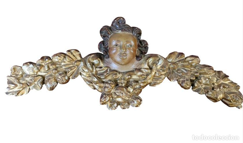 Arte: CABEZA DE QUERUB&Iacute;N ALADO. TALLA EN MADERA POLICROMADA. ESPA&Ntilde;A. SIGLO XVIII.