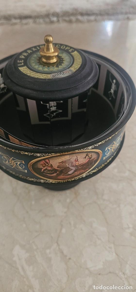 Arte: Praxinoscopio bronce y madera