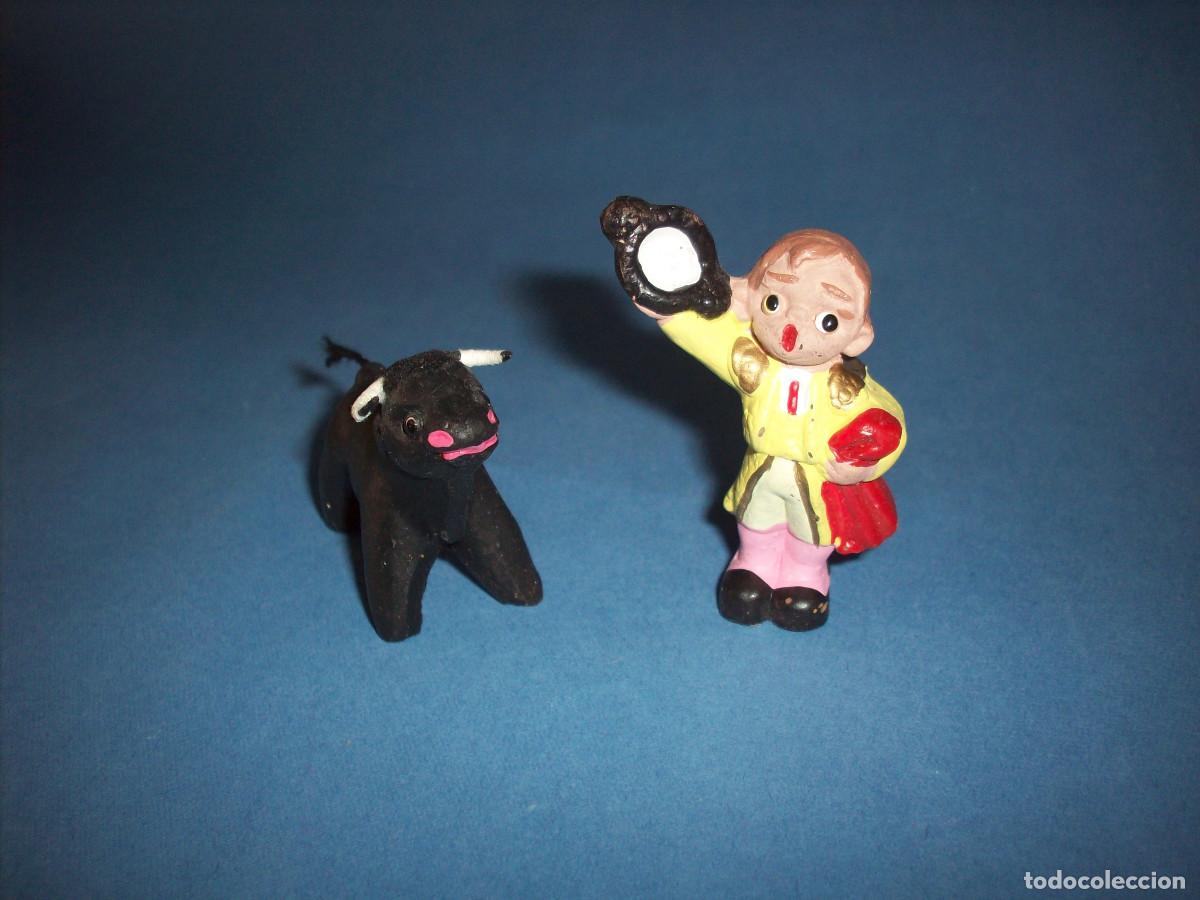 Arte: figuritas de torero y toro de terracota alborox