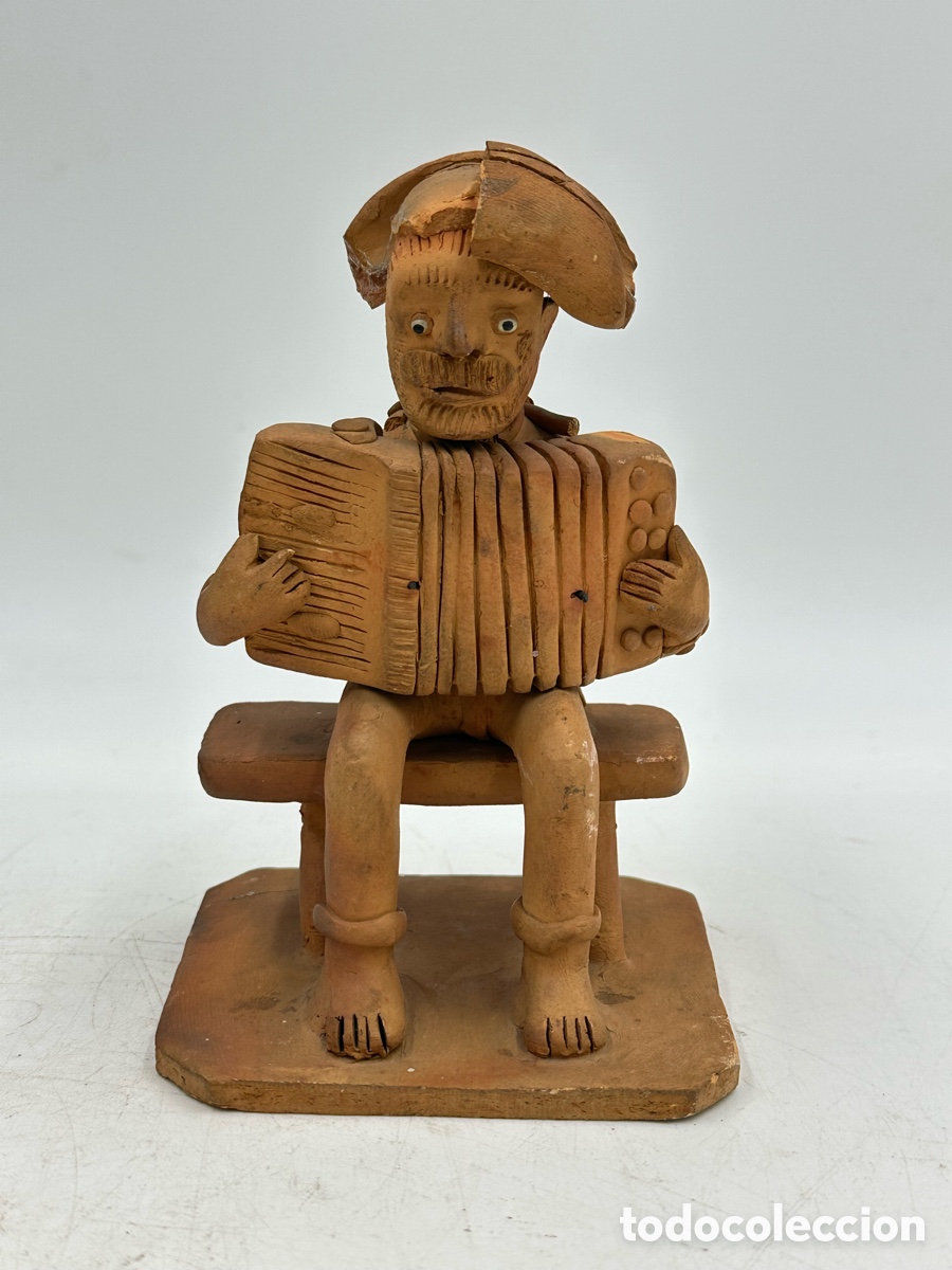 Arte: Figura de terracota o barro cocido - Joao Esequiel - Brasil