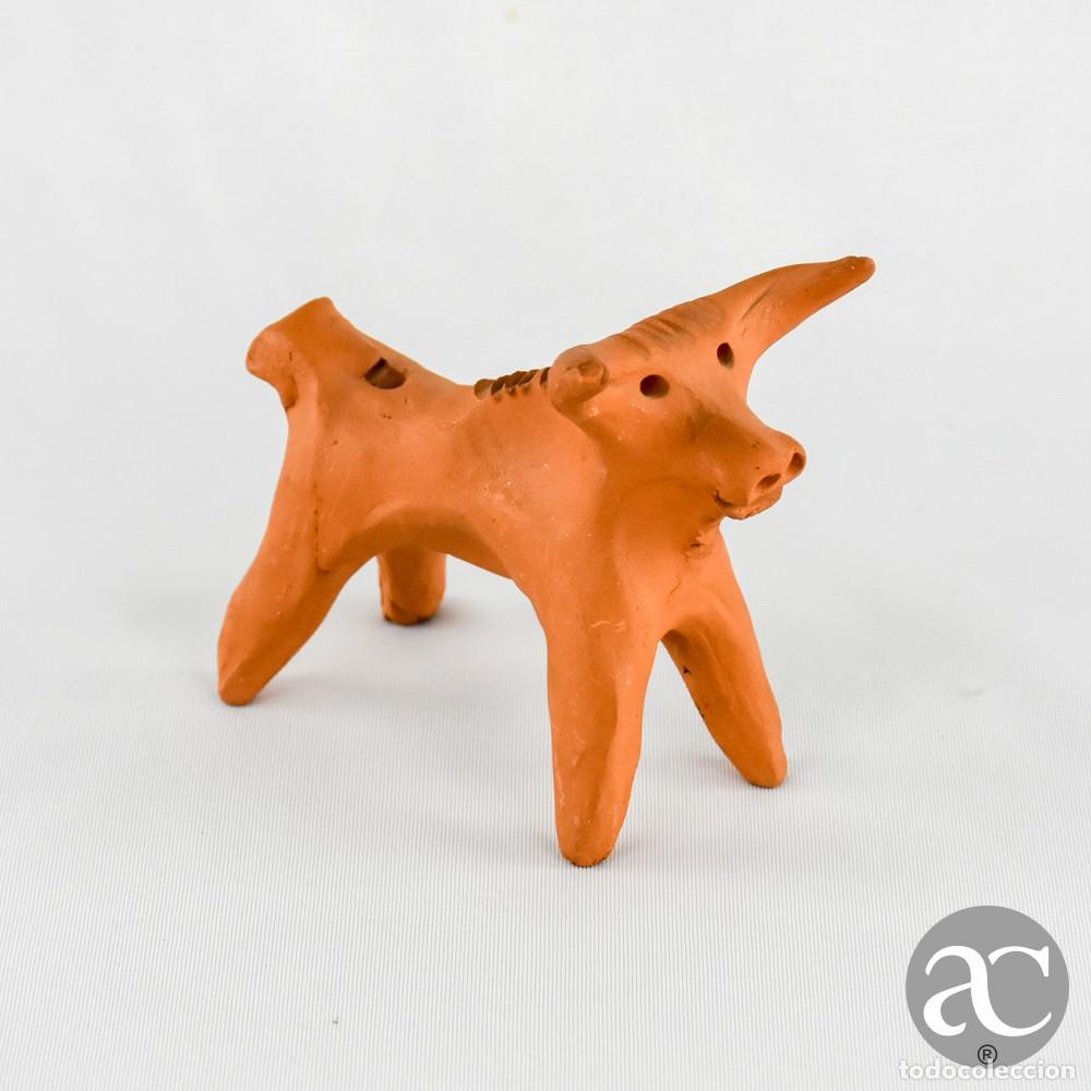 Arte: Apito em terracota em forma de Touro