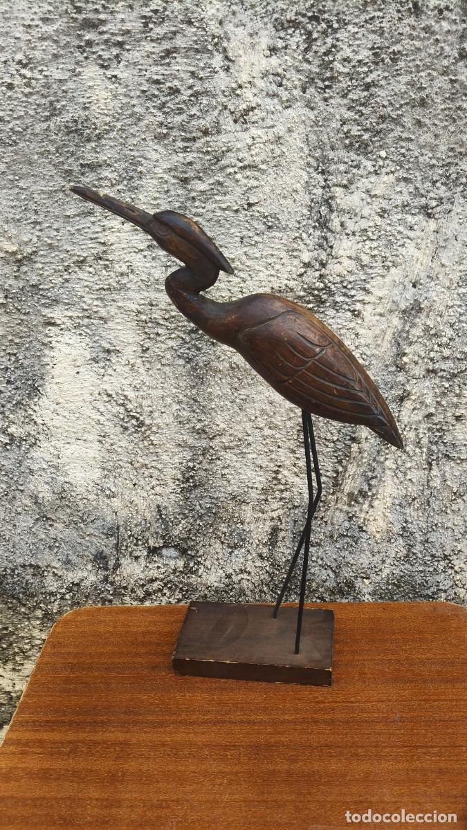 Arte: Sculpture bois d un h&eacute;ron 1900