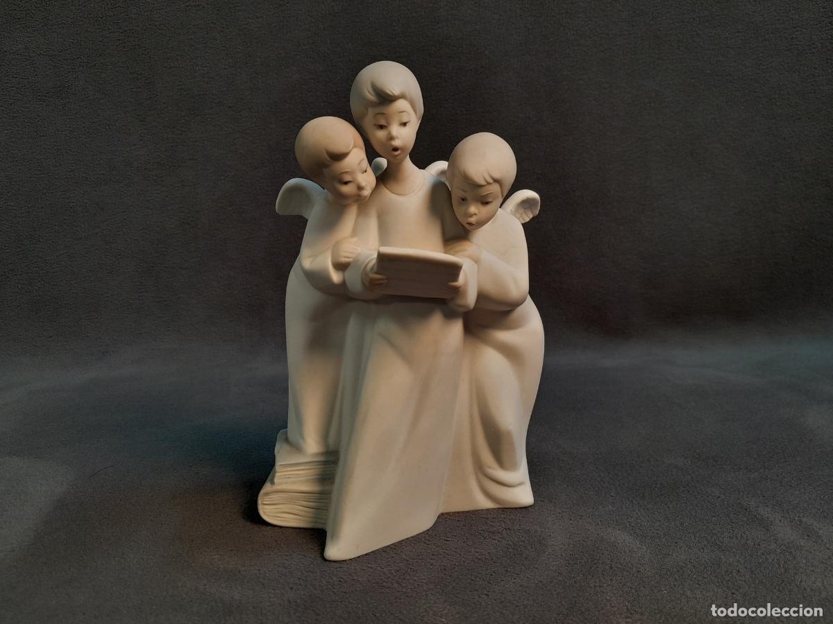 Arte: GRUPO ESCULT&Oacute;RICO DE &Aacute;NGELES CANTORES EN PORCELANA MATE MARCA NAO. SIGLO XX