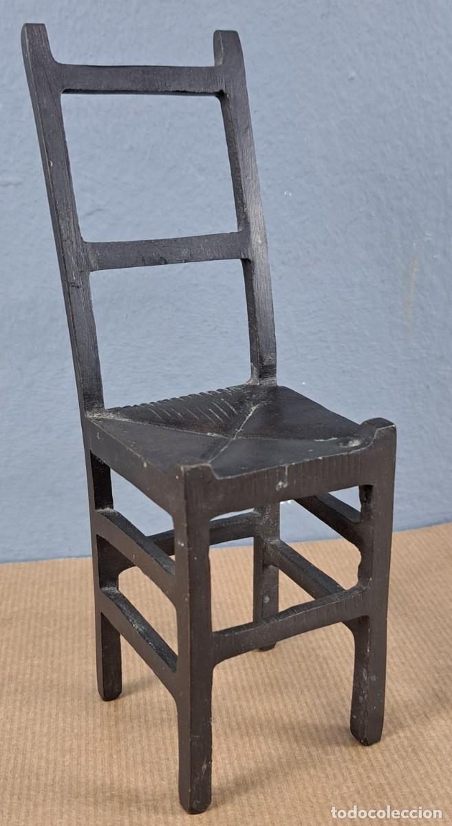 Arte: Silla, escultura de bronce, siglo XX