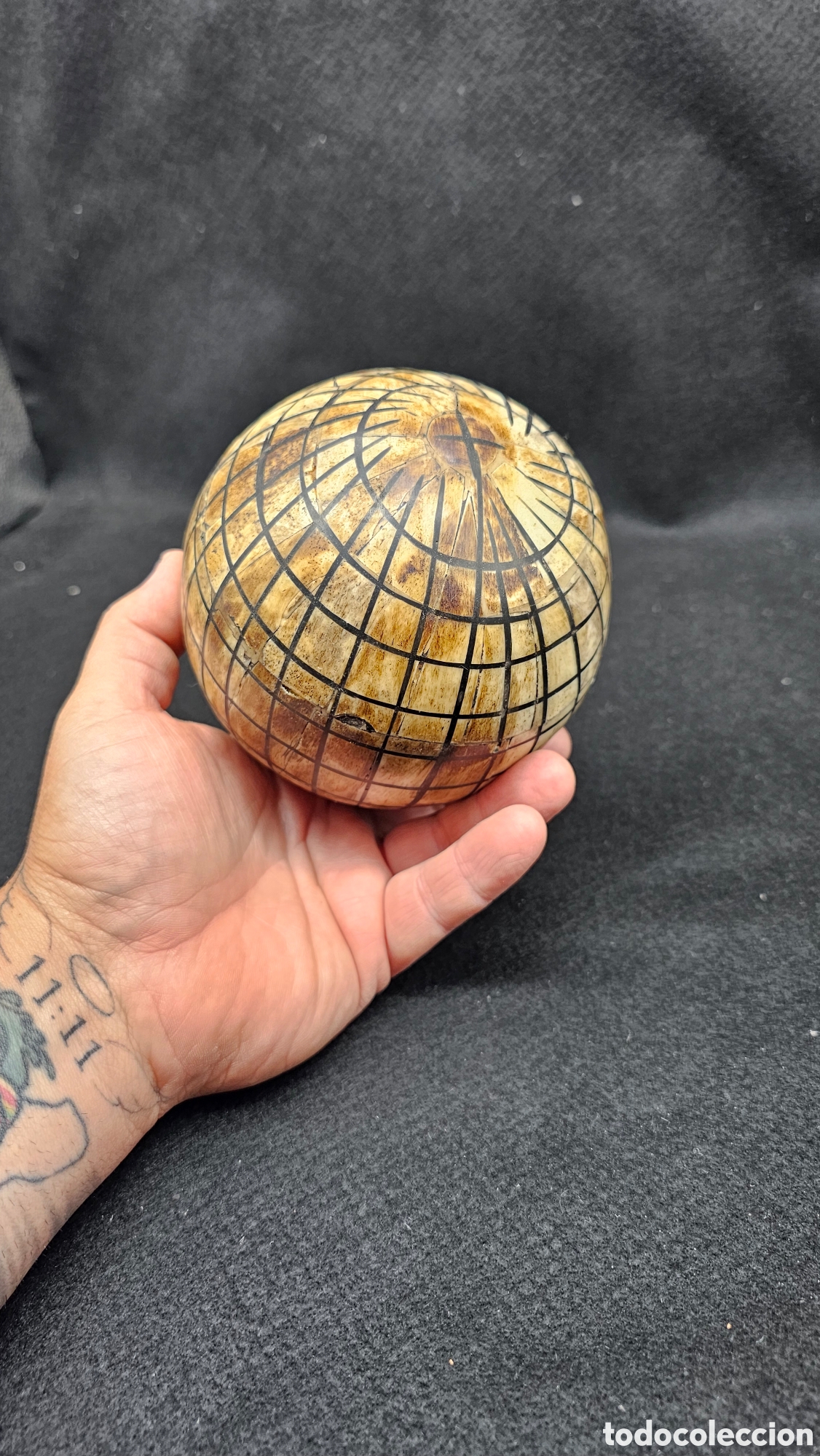 Arte: Esfera de hueso.......