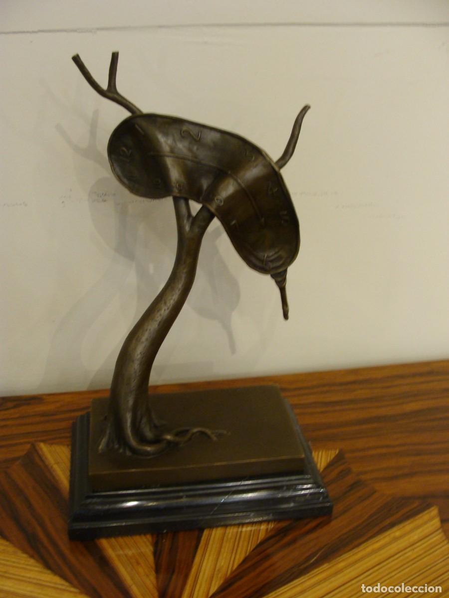 Arte: Perfil del Tiempo escultura en bronce