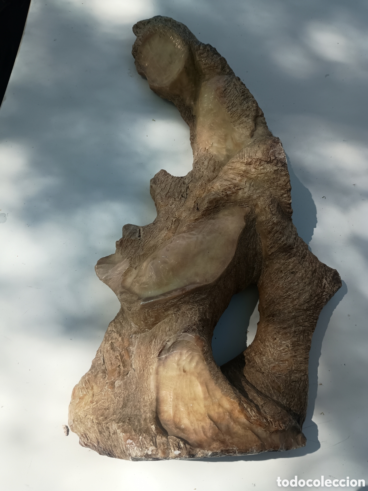 Arte: Escultura piedra mujer