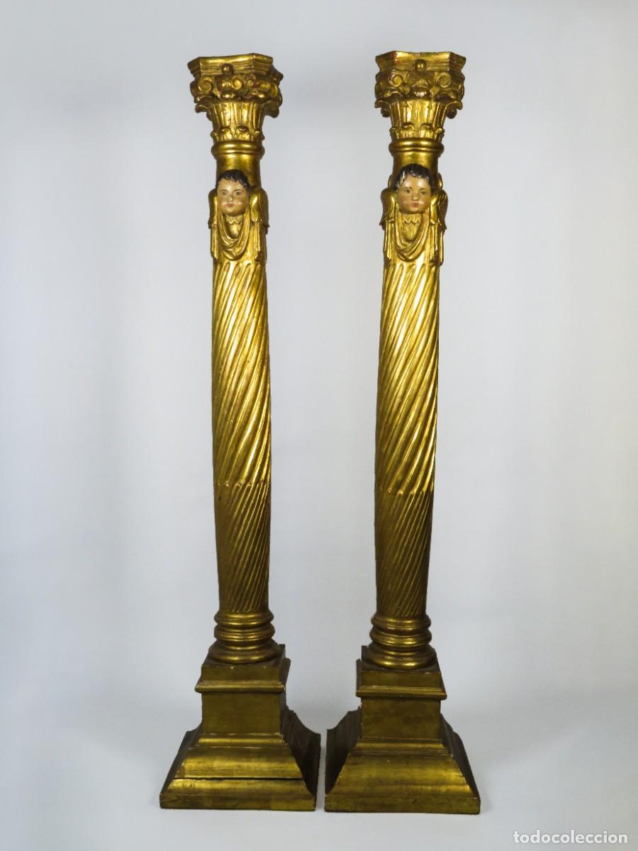 Arte: Pareja de columnas en madera tallada y dorada decorada con querubines escuela espa&ntilde;ola del siglo XIX