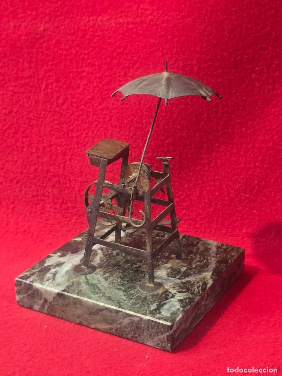 Arte: PEQUE&Ntilde;A ESCULTURA DE CARRO AFILADOR