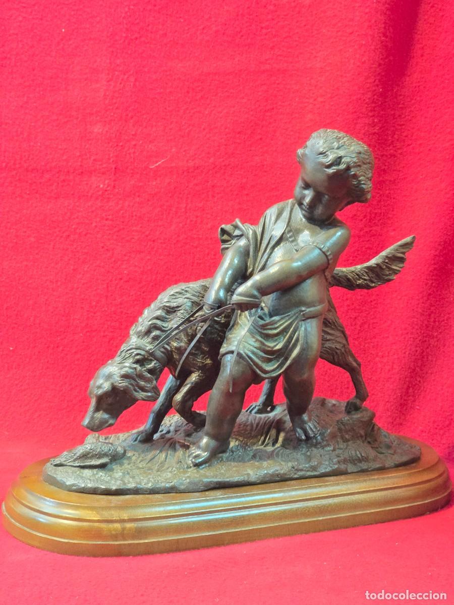 Arte: ESCULTURA DE BRONCE NI&Ntilde;O CON PERRO