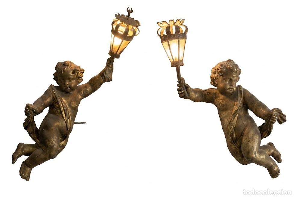 Arte: PAREJA DE ANTIGUOS ANGELOTES O PUTTI DE ESTILO BARROCO. MADERA ESTOFADA EN ORO. ESPA&Ntilde;A. SIGLO XVII.