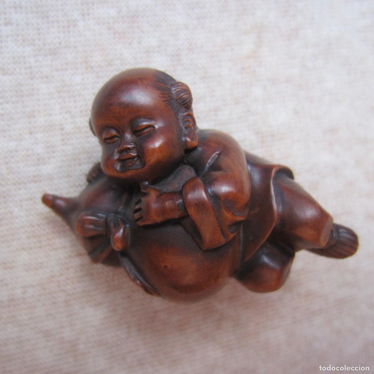 Arte: netsuke japones ni&ntilde;o tallado en madera firmado