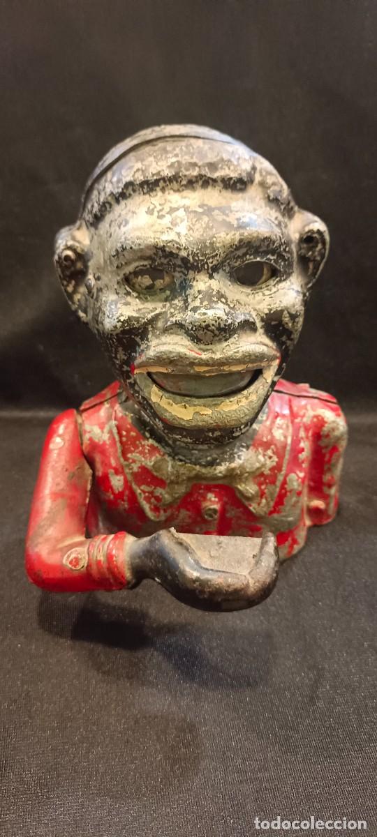 Arte: ANTIGUA HUCHA AUTOMATA ARTICULADA``EL NEGRO ALEGRE&acute;&acute;ESPA&Ntilde;A A&Ntilde;OS 40 - 50