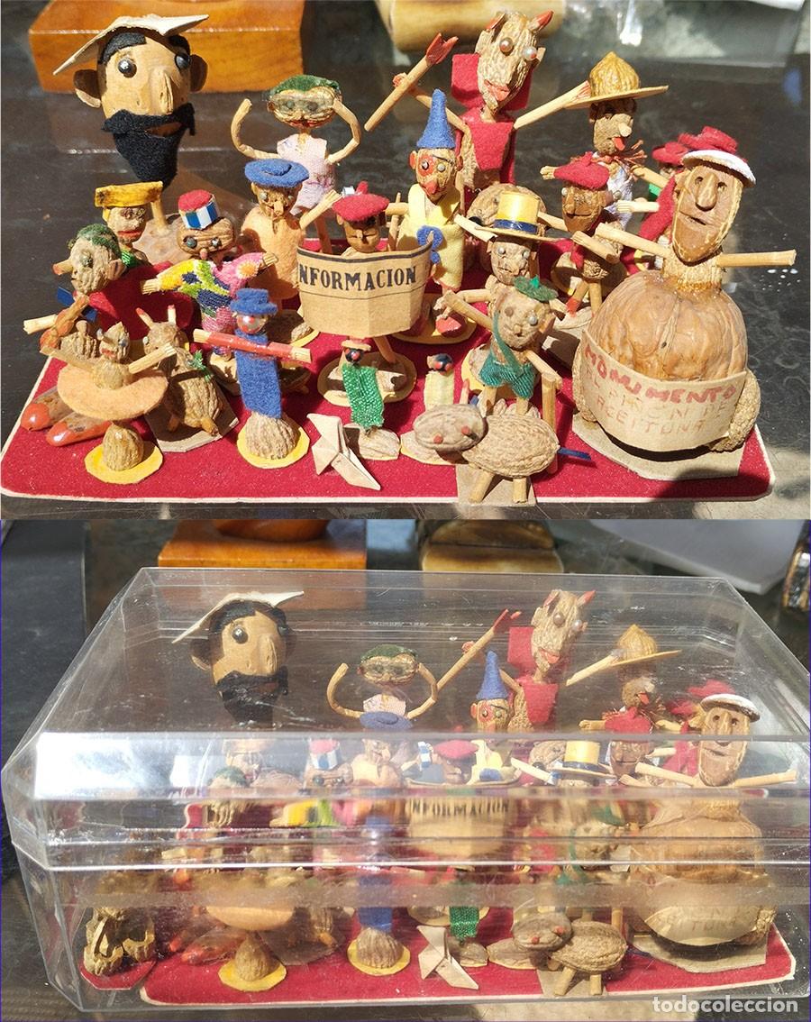 Arte: 25 FIGURAS HECHAS ARTESANALMENTE CON HUESOS DE ACEITUNA CASCARAS DE NUEZ Y PI&Ntilde;ONES EL MAS GRANDE MID
