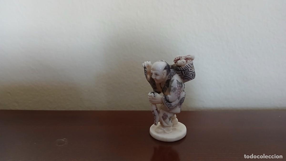 Art: antiguo netsuke hombre pescador tallado a mano