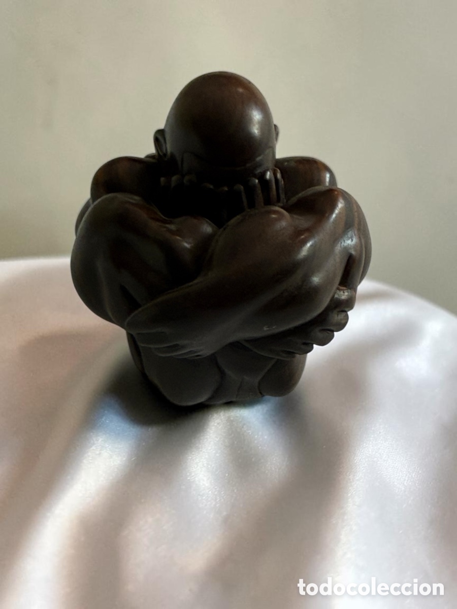Arte: Figura de Buda en madera