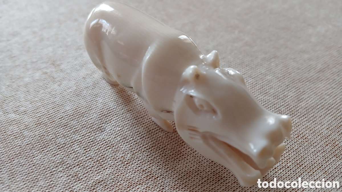 Arte: figura hipop&oacute;tamo de marfil