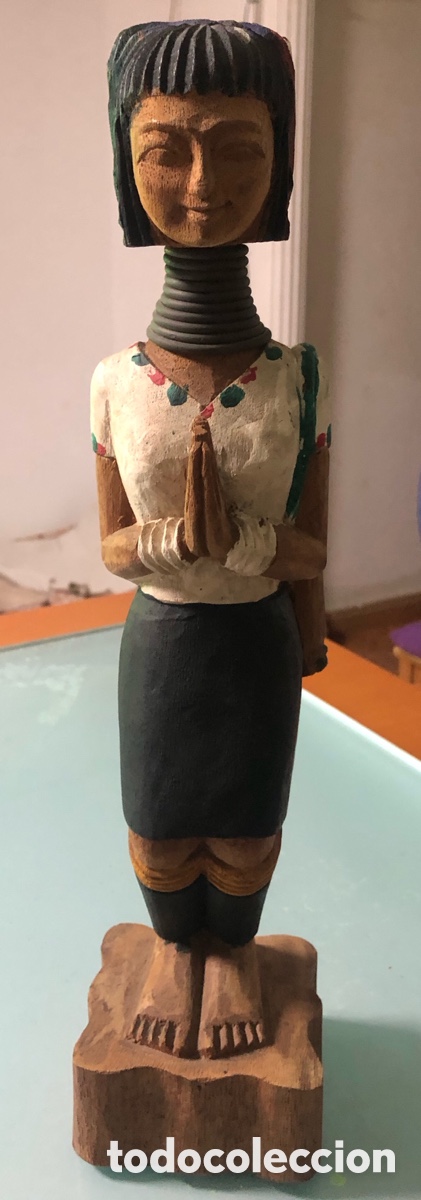 Arte: Figuras de madera tallada