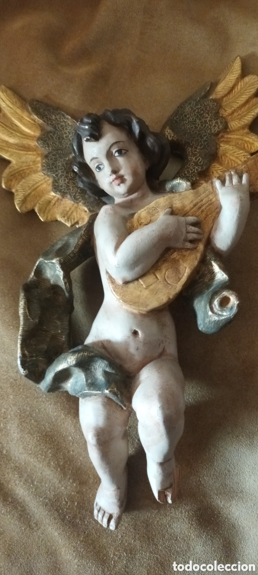 Arte: Talla en madera de Angel musico