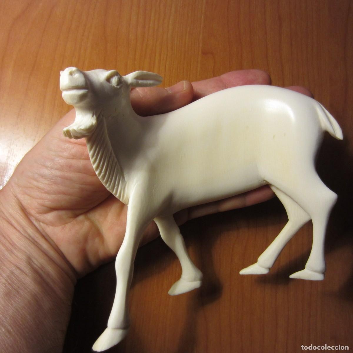 Arte: figura de marfil antigua