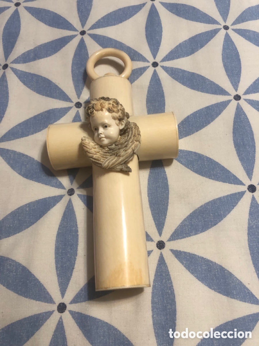 Arte: Cruz en marfil con angelito