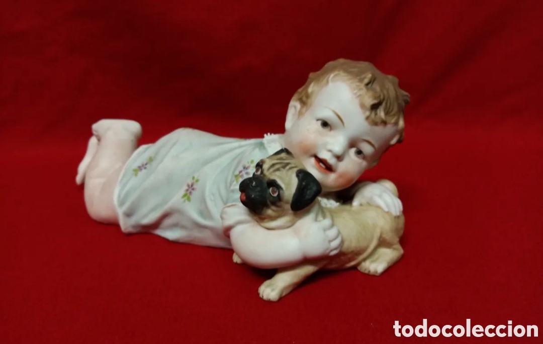 Arte: Porcelana Biscuit baby piano con Caniche