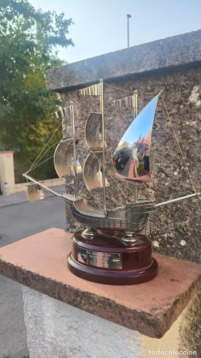 Arte: Sculpture bronze argent&eacute; Troph&eacute;e