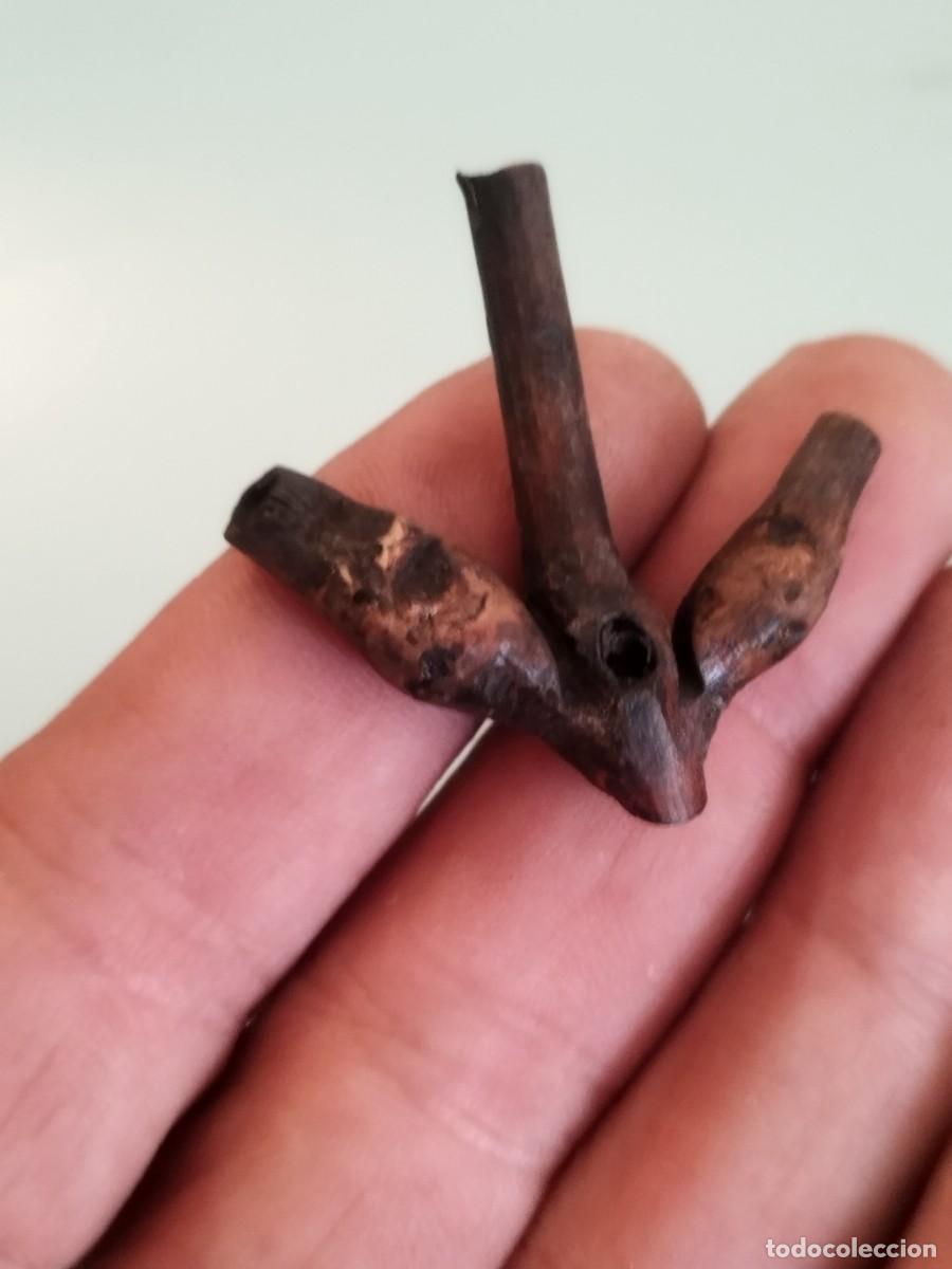Arte: Antigua pieza de madera a identificar.