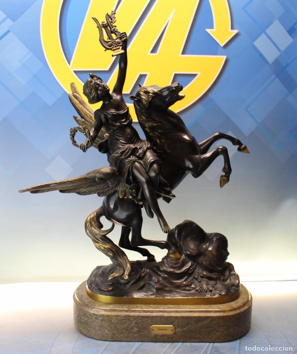 Arte: Escultura bronce de la casa Soher. Musa montando a Pegaso. Pieza numerada 206/400.