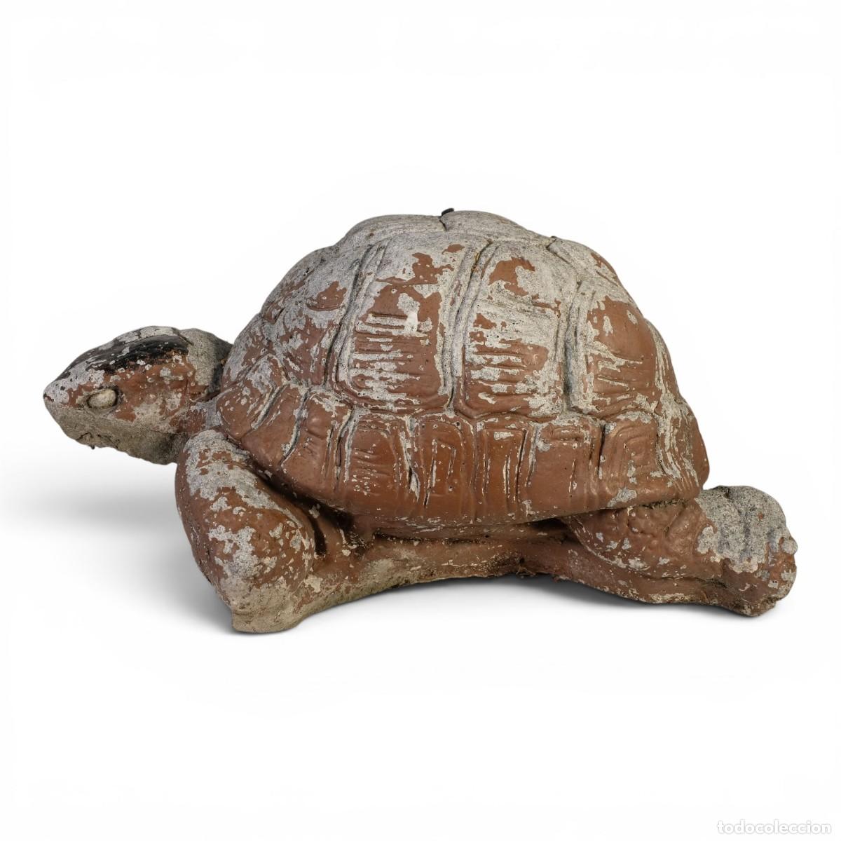 Art: Escultura en piedra. Representando tortuga.