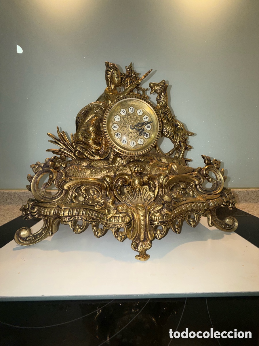 Arte: Relog de bronce, muy poco uso pesa 8,300 Klg. Funciona con pila