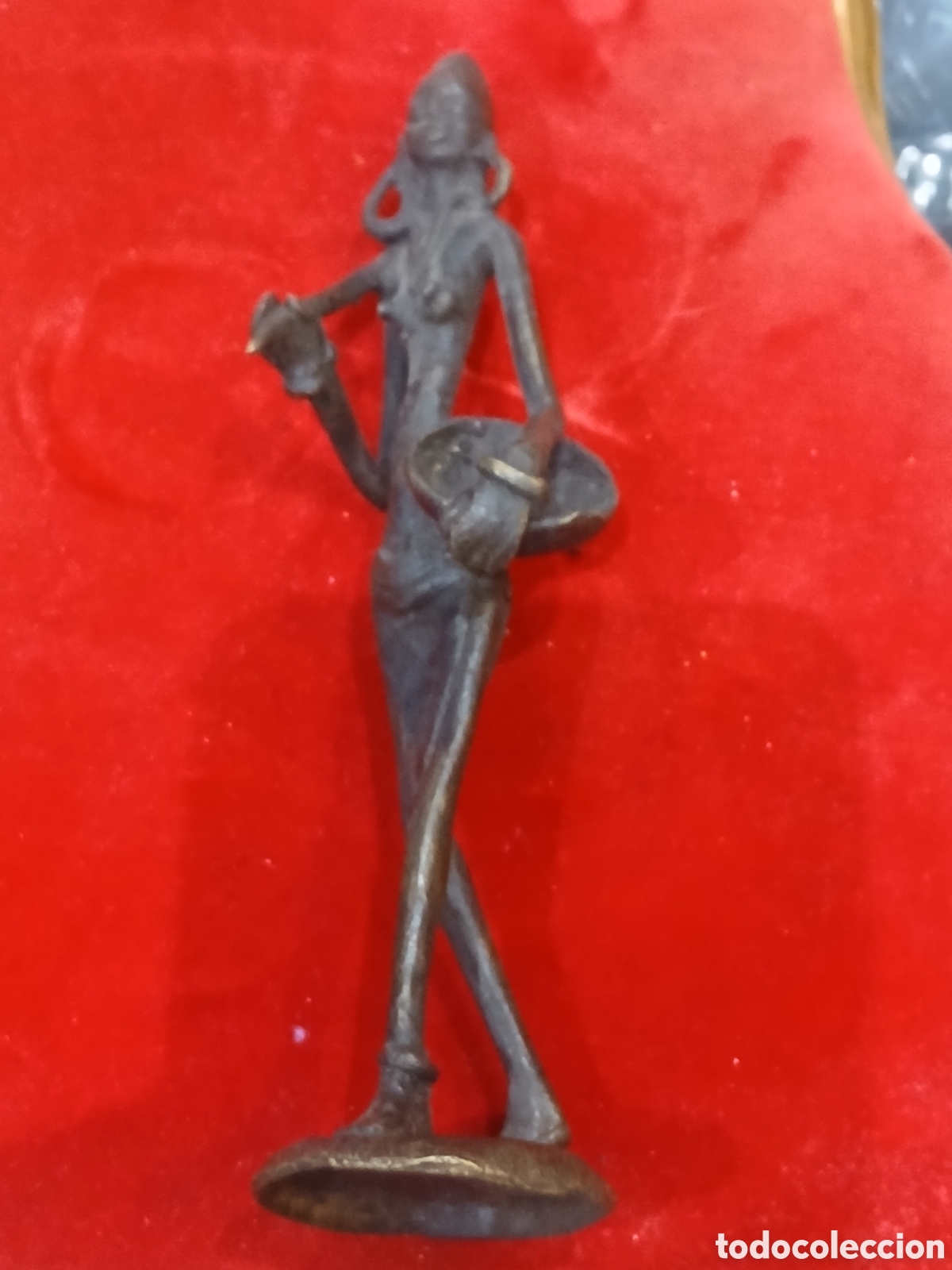 Arte: Figura de bronce africano