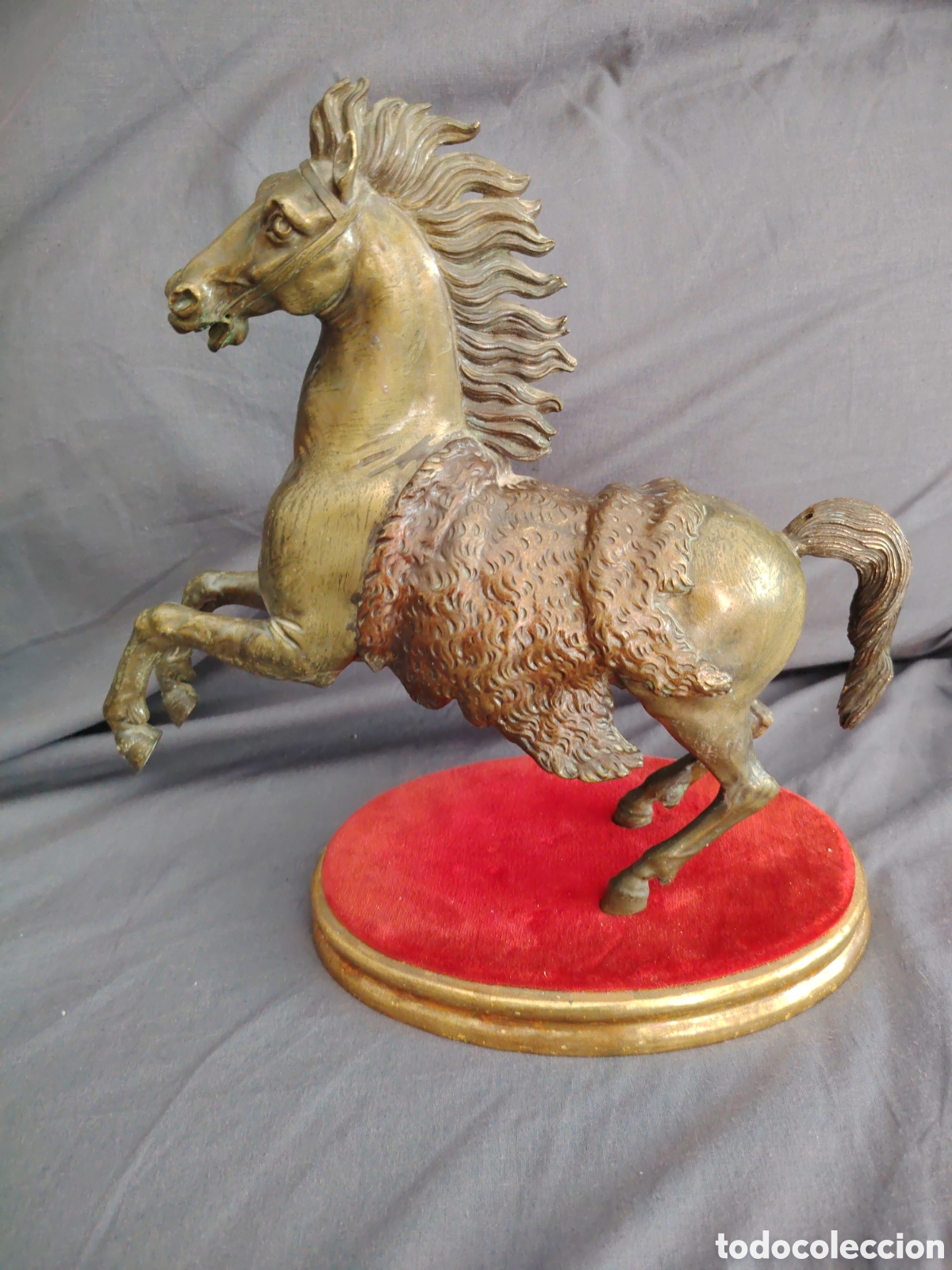 Art: Antiguo caballo de metal