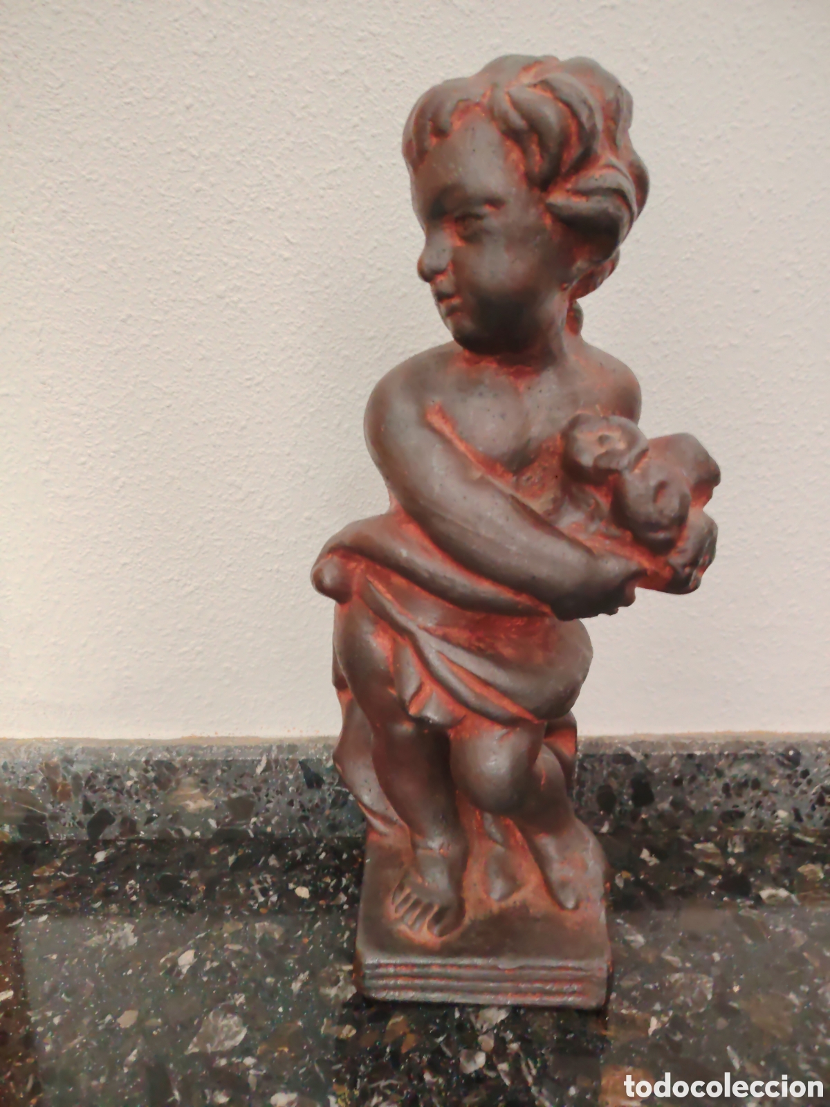 Arte: Querub&iacute;n de terracota raro
