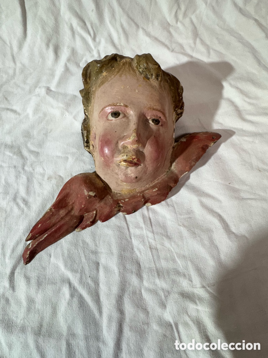 Kunst: Cabeza de angelote policromada s XVIII