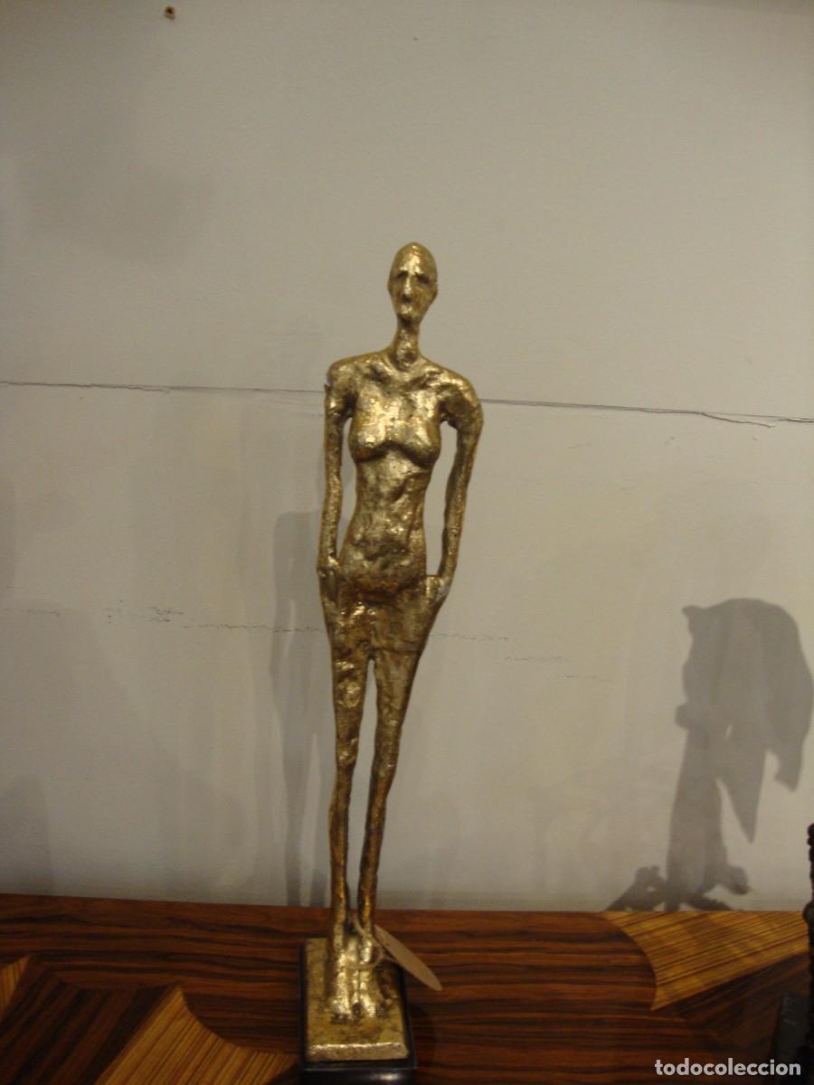 Arte: Escultura realizada en hierro dorado