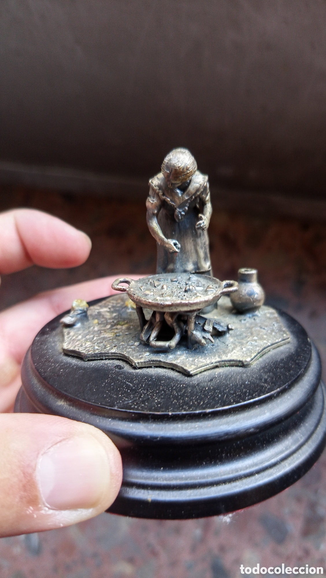 Arte: Escultura de una persona cocinando