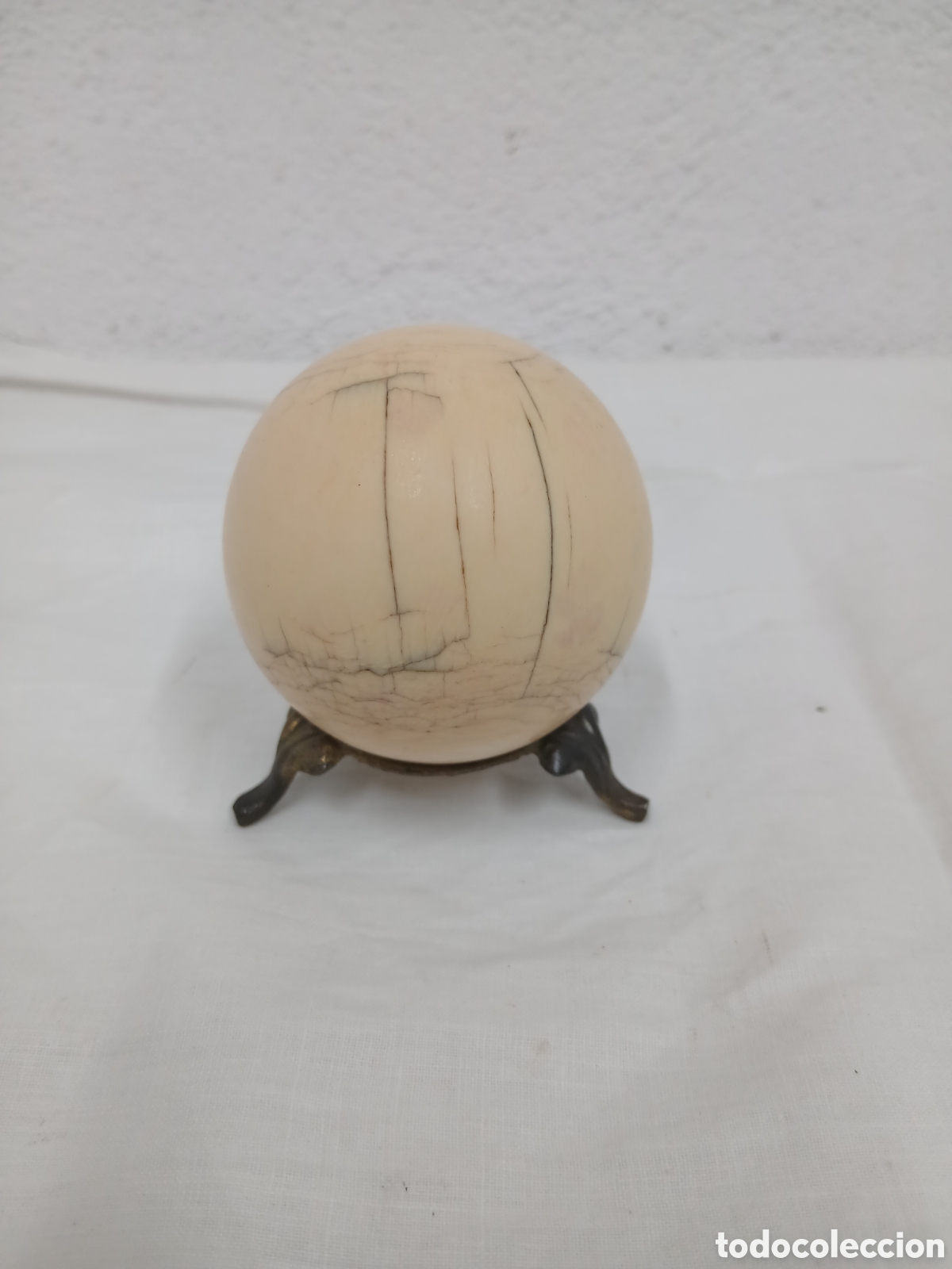 Arte: Bola marfil centenaria.
