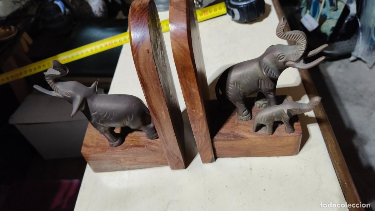 Arte: Serre livre bois et bronze 1960 inde