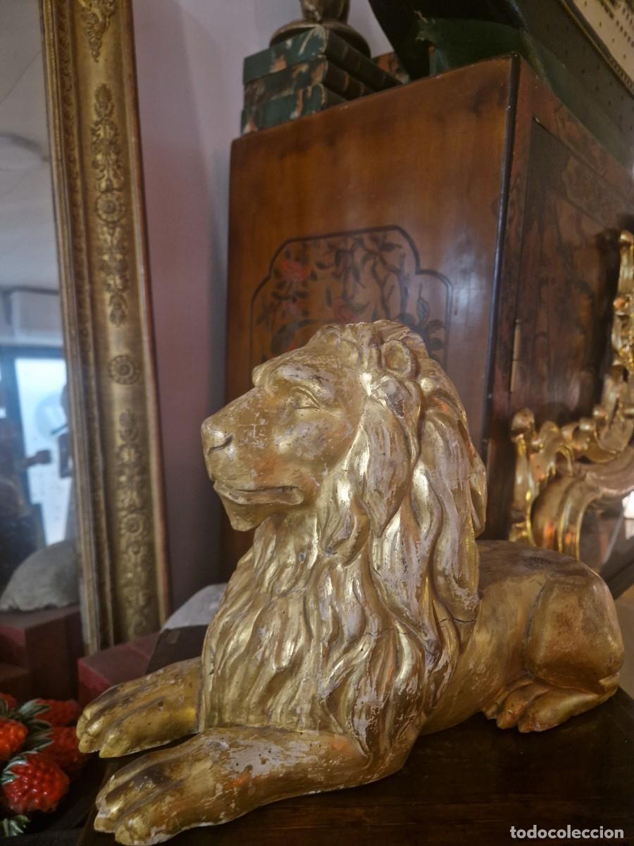 Arte: Le&oacute;n de madera tallada y pan de oro, siglos XVIII-XIX.