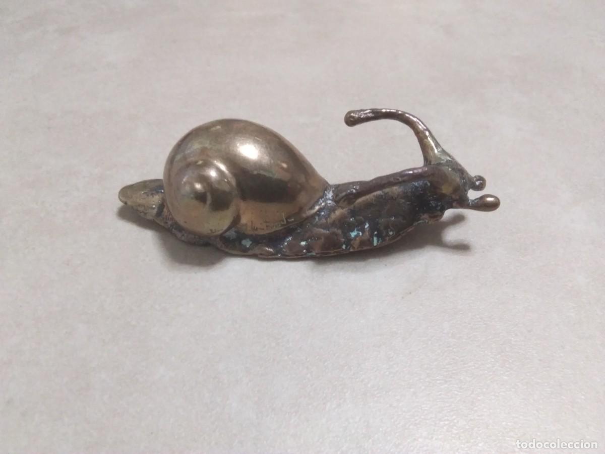Arte: Escultura peque&ntilde;o caracol en bronce. Jos&eacute; Lu&iacute;s Fern&aacute;ndez