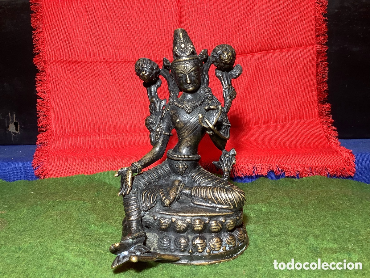 Art: Figura budista en bronce.