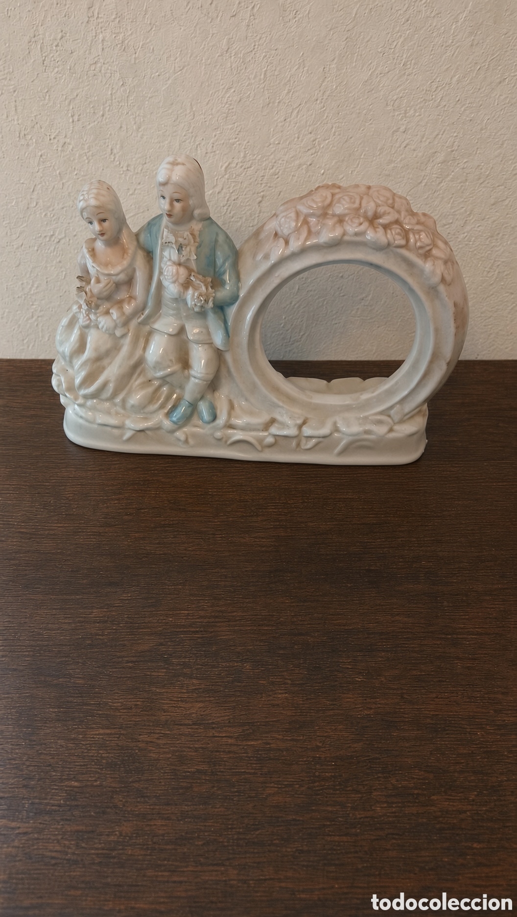 Arte: figura de porcelana de una pareja
