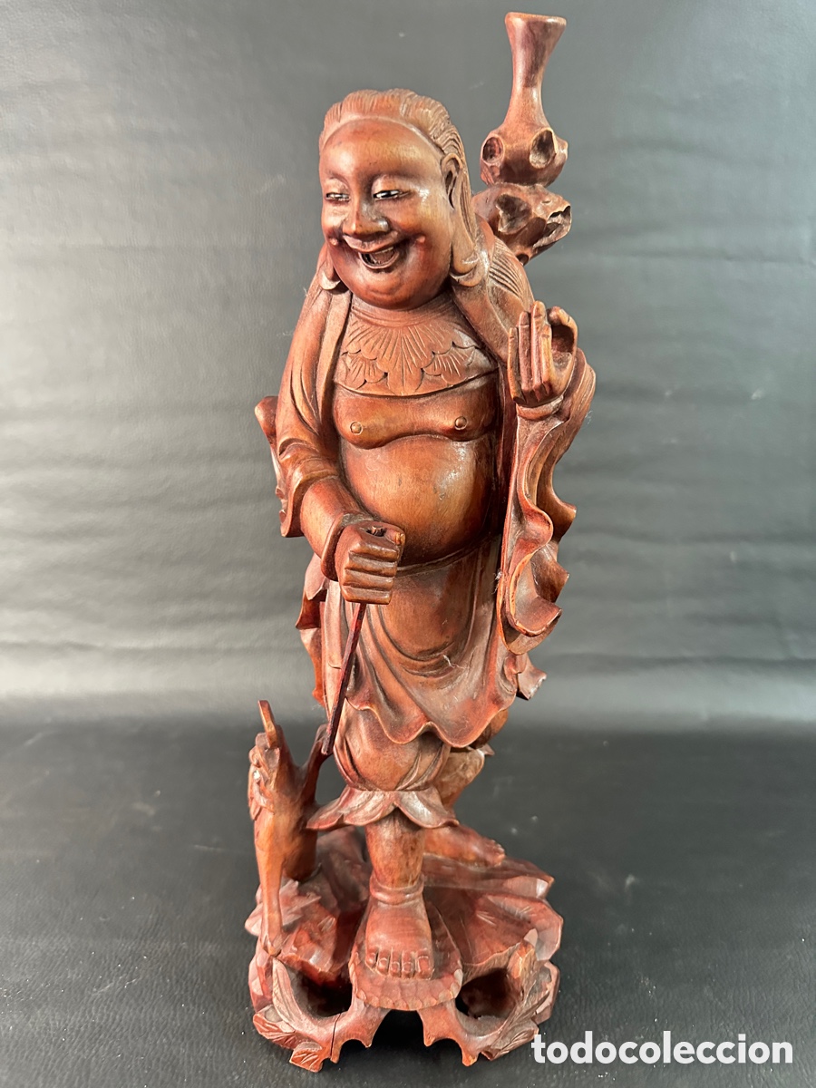 Art: Escultura oriental tallada en madera