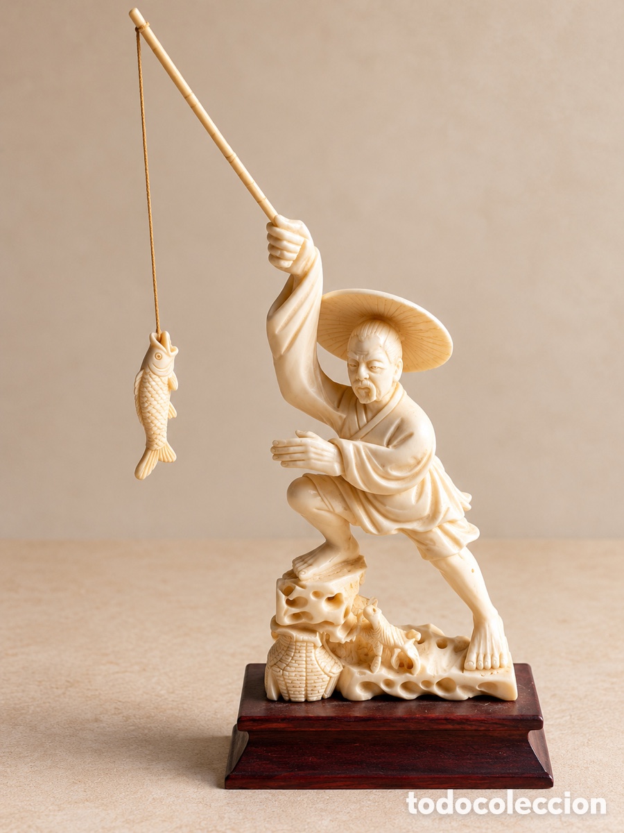 Arte: Pescador oriental de marfil de unos 15 cm