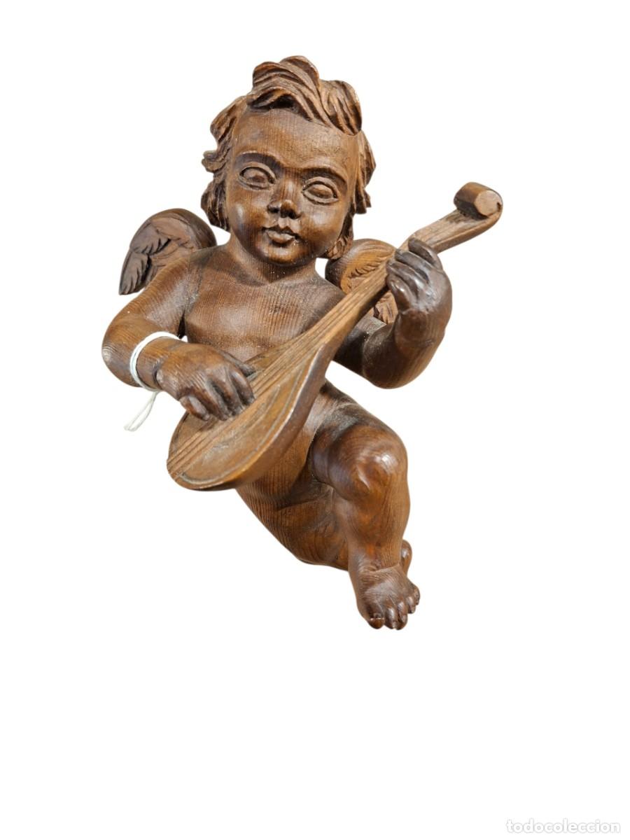 Arte: Angel querubin tocando el laud tallado a mano en madera