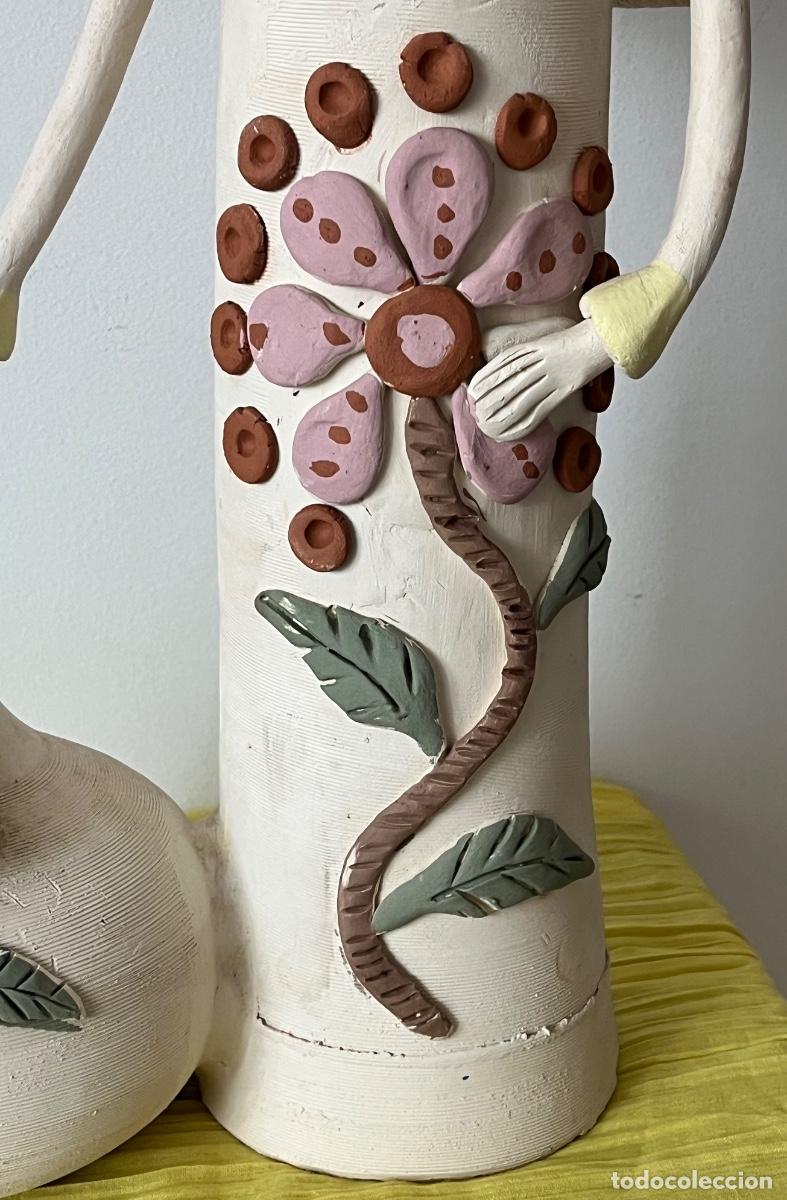 Arte: MUJER EXTREME&Ntilde;A CON JARR&Oacute;N